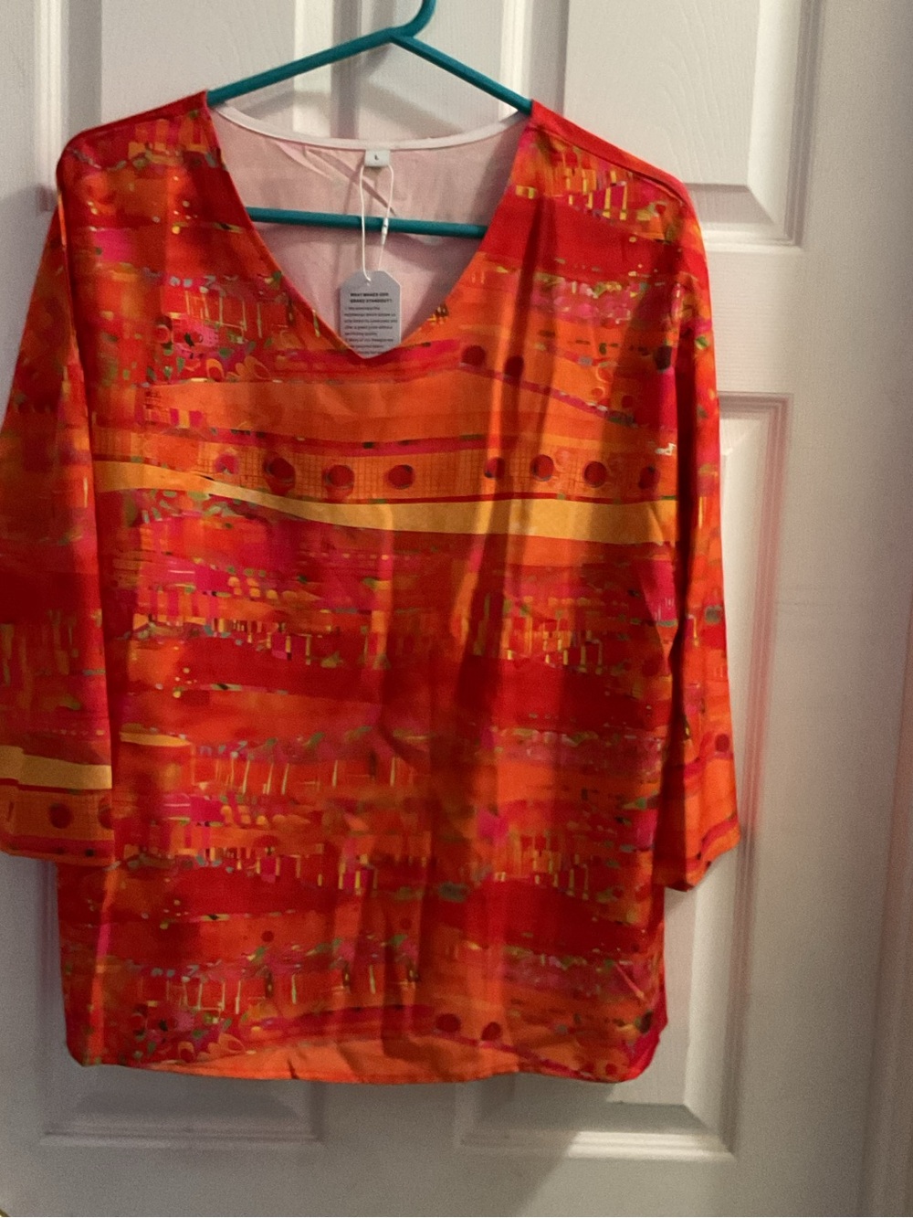 Women's Bright Orange Printed V-Neck Top